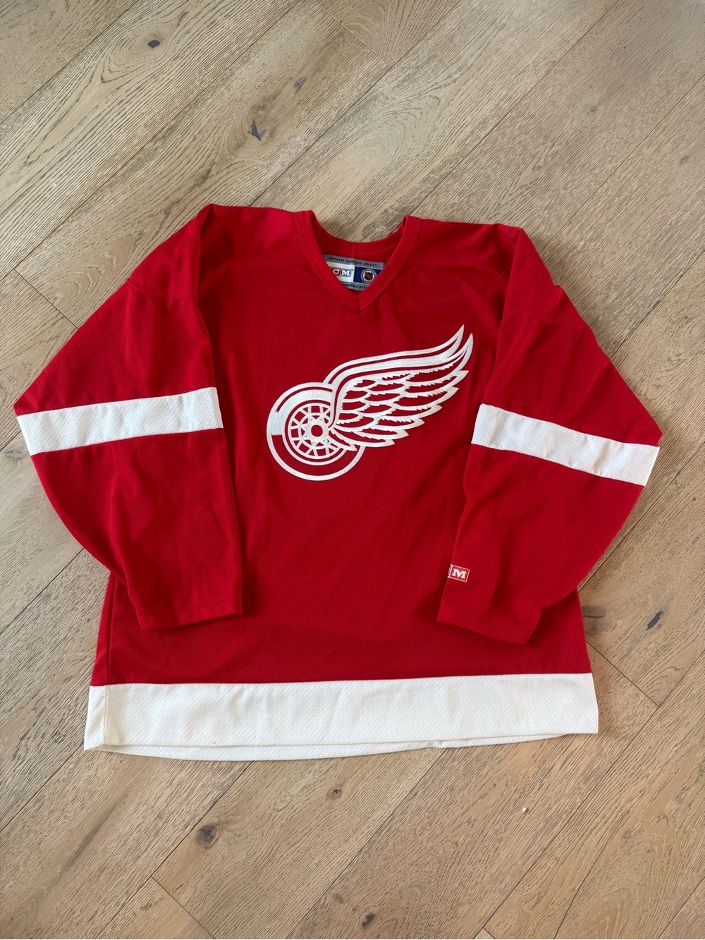 CCM Red Hockey Jersey with White Wing Logo